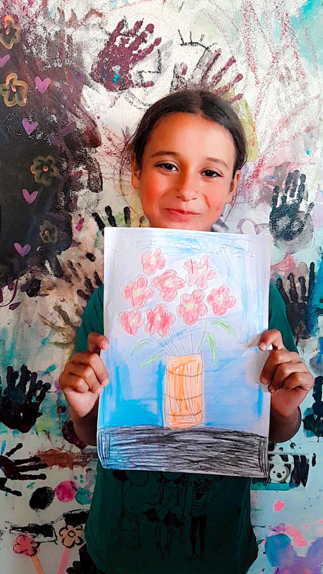 Ellen con il suo disegno